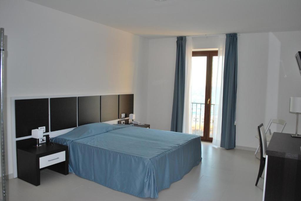 Buddi Hotel Platamona Quarto foto